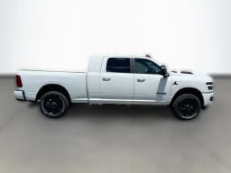 Ram 2500 Laramie 4x4 Mega Cab 6'4" Box 2026 — side view