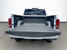 Ram 2500 Laramie 4x4 Mega Cab 6'4" Box 2026 — side view