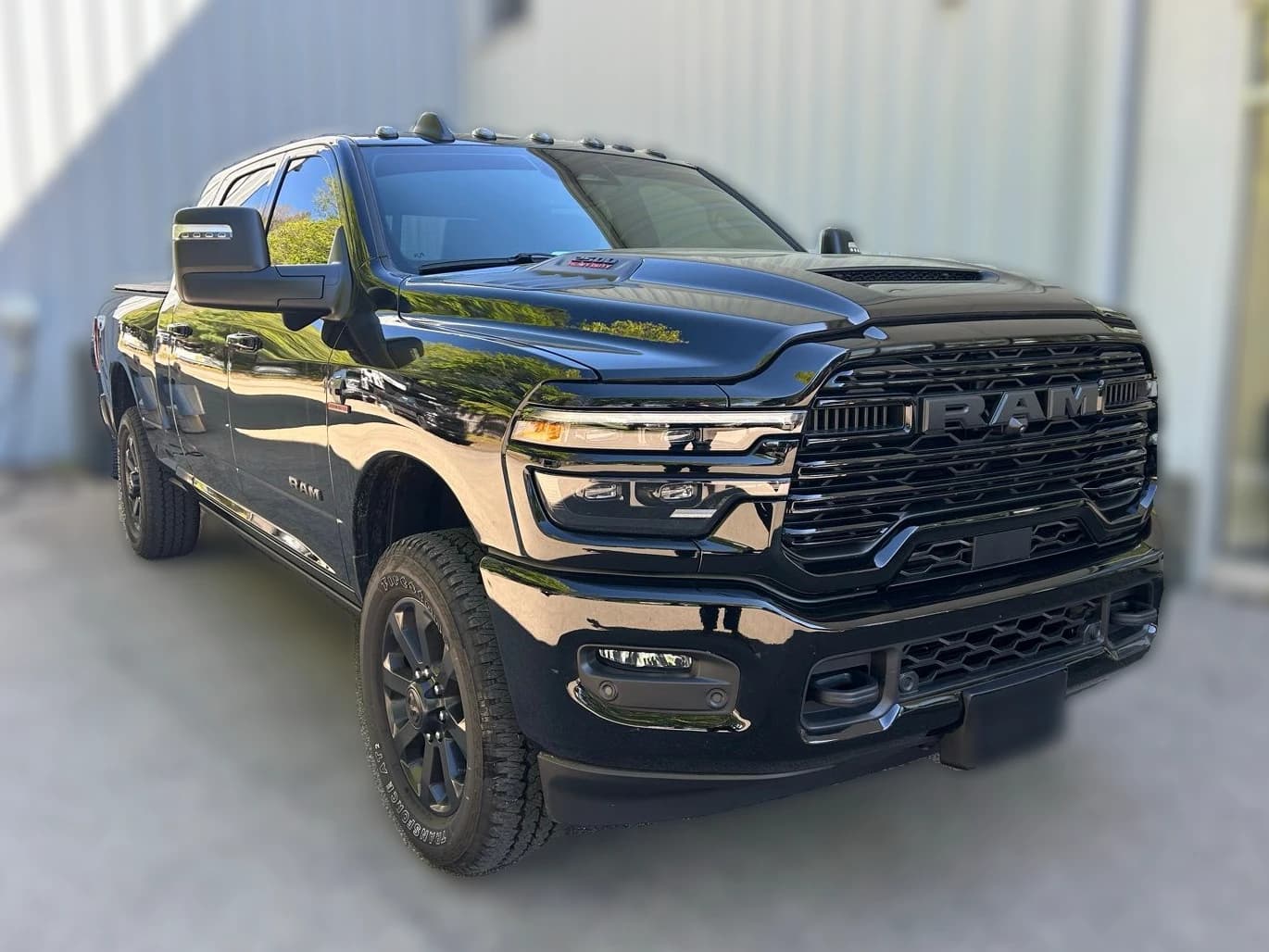 Ram 2500 Laramie 4x4 Mega Cab 6'4" Box 2026 — side view