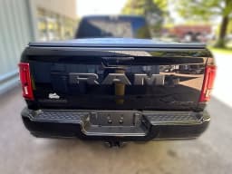 Ram 2500 Laramie 4x4 Mega Cab 6'4" Box 2026 — side view