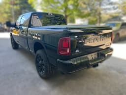 Ram 2500 Laramie 4x4 Mega Cab 6'4" Box 2026 — side view