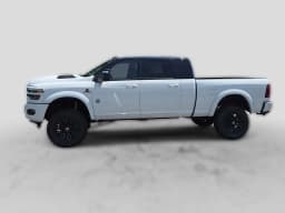 Ram 2500 Laramie 4x4 Mega Cab 6'4" Box 2026 — side view