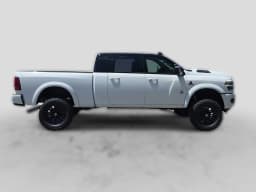 Ram 2500 Laramie 4x4 Mega Cab 6'4" Box 2026 — side view