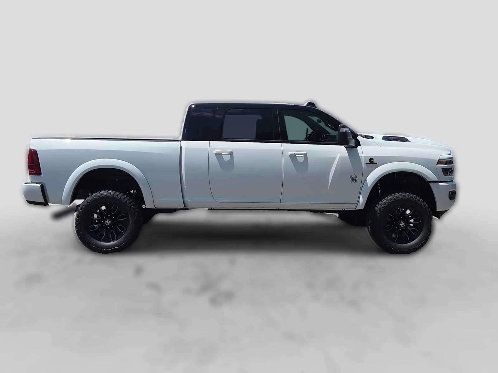 Ram 2500 Laramie 4x4 Mega Cab 6'4" Box 2026 — side view