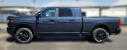 Ram 2500 Laramie 4x4 Mega Cab 6'4" Box 2026 — side view