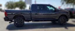 Ram 2500 Laramie 4x4 Mega Cab 6'4" Box 2026 — side view