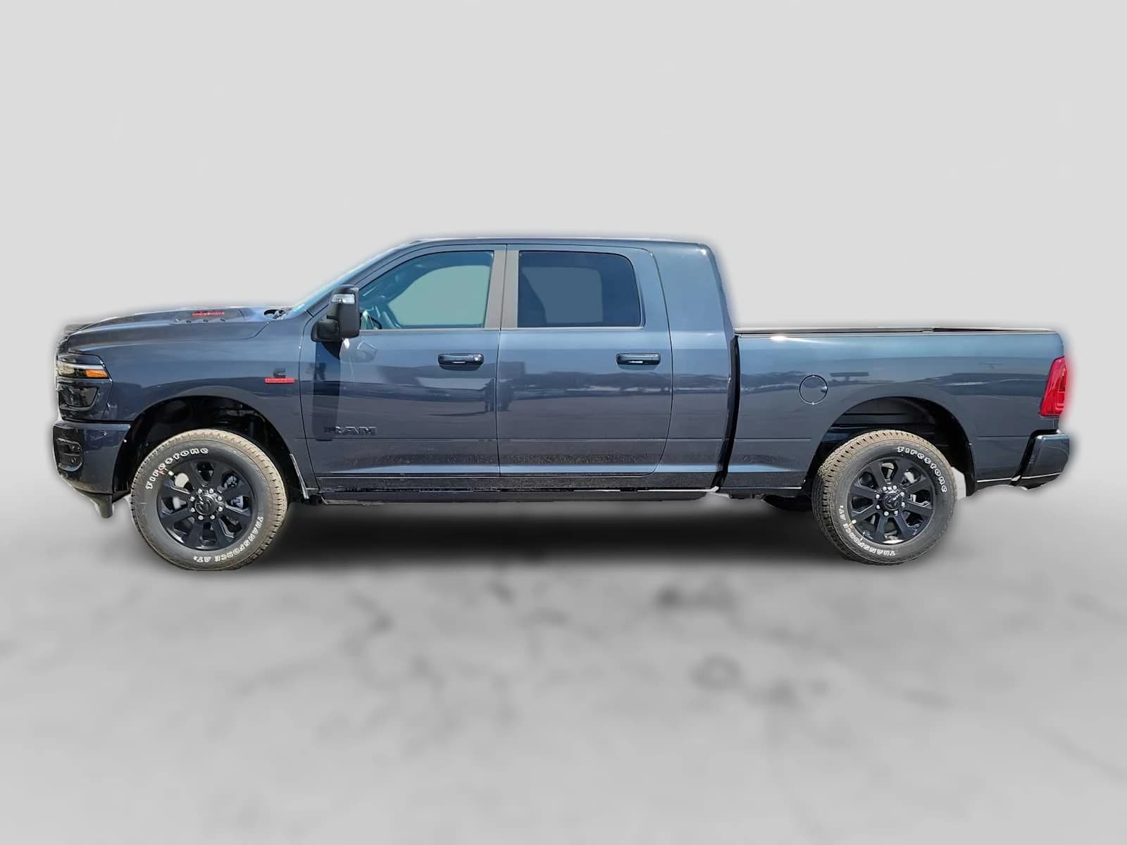 Ram 2500 Laramie 4x4 Mega Cab 6'4" Box 2026 — side view