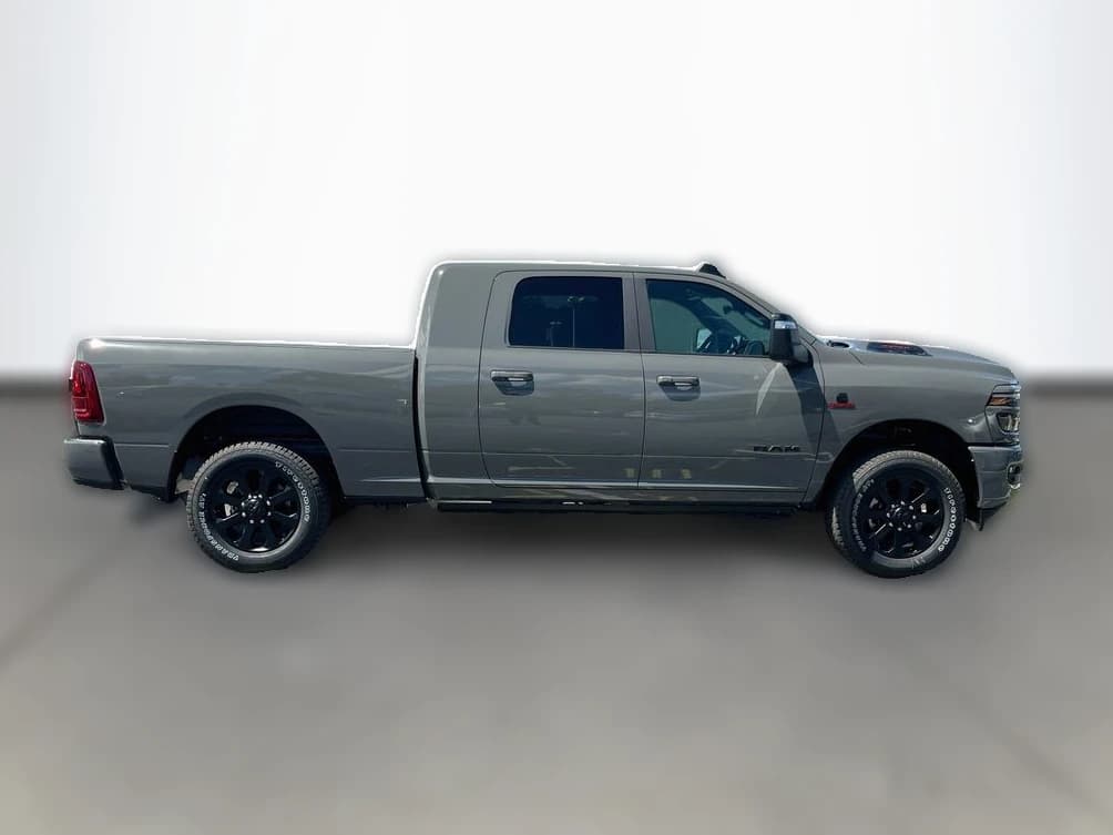 Ram 2500 Laramie 4x4 Mega Cab 6'4" Box 2026 — side view