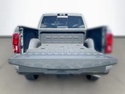 Ram 2500 Laramie 4x4 Mega Cab 6'4" Box 2026 — side view