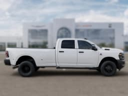 Ram 3500 Tradesman 4x4 Crew Cab 8' Box 2026 — side view