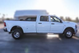 Ram 3500 Tradesman 4x4 Crew Cab 8' Box 2026 — side view