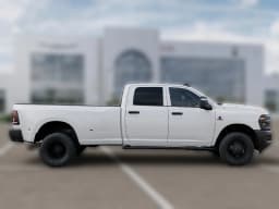 Ram 3500 Tradesman 4x4 Crew Cab 8' Box 2027 — side view