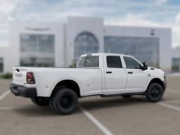 Ram 3500 Tradesman 4x4 Crew Cab 8' Box 2027 — side view