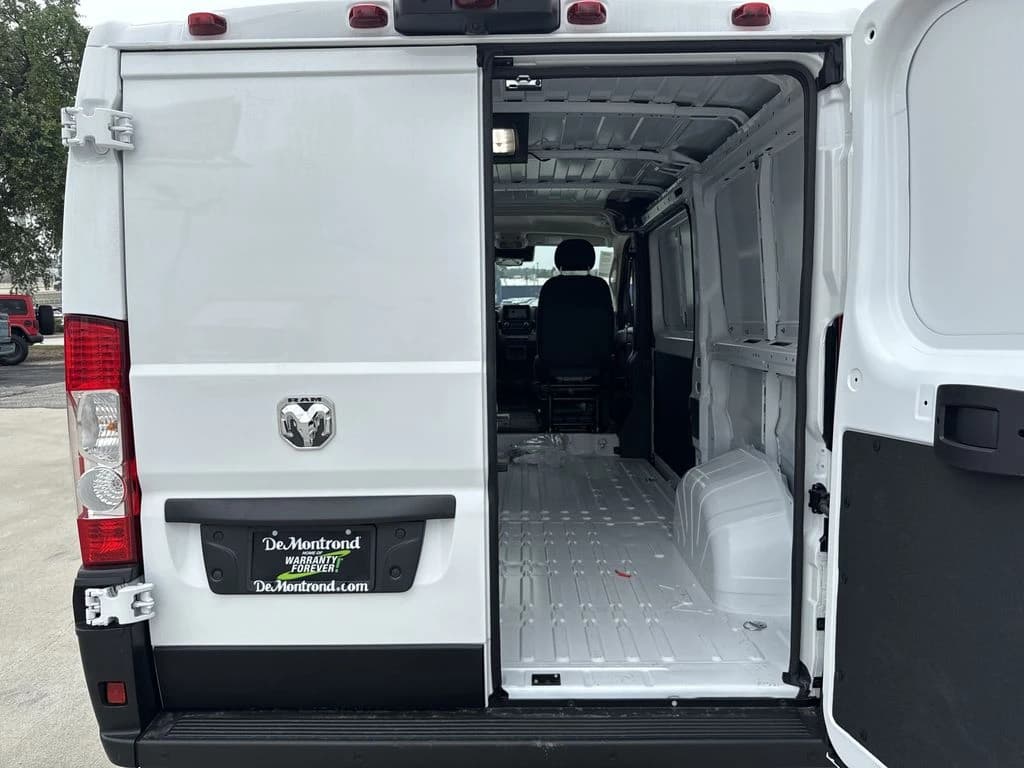 Ram ProMaster Cargo Van Tradesman 1500 Low Roof 136" WB w/Pass Seat 2026 — side view