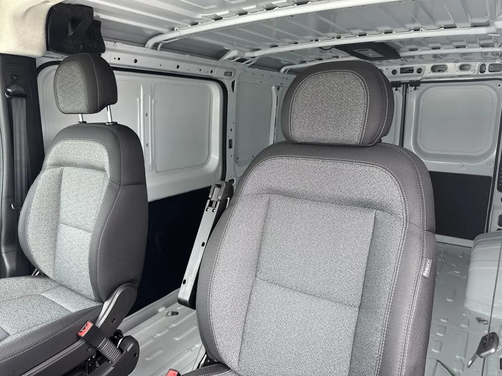 Ram ProMaster Cargo Van Tradesman 1500 Low Roof 136" WB w/Pass Seat 2026 — side view