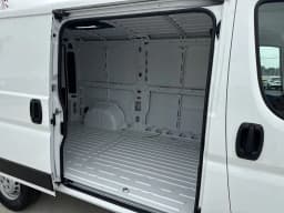 Ram ProMaster Cargo Van Tradesman 1500 Low Roof 136" WB w/Pass Seat 2026 — side view