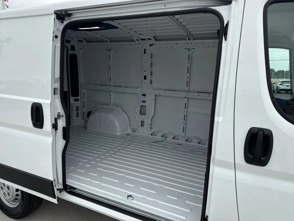 Ram ProMaster Cargo Van Tradesman 1500 Low Roof 136" WB w/Pass Seat 2026 — side view