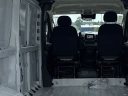 Ram ProMaster Cargo Van Tradesman 1500 Low Roof 136" WB w/Pass Seat 2026 — side view