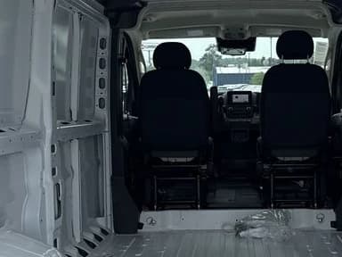 Ram ProMaster Cargo Van Tradesman 1500 Low Roof 136" WB w/Pass Seat 2026 — side view