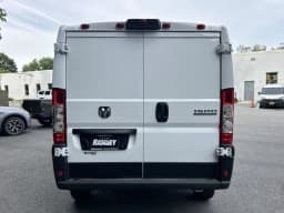 Ram ProMaster Cargo Van Tradesman 1500 Low Roof 118" WB w/Pass Seat 2026 — side view