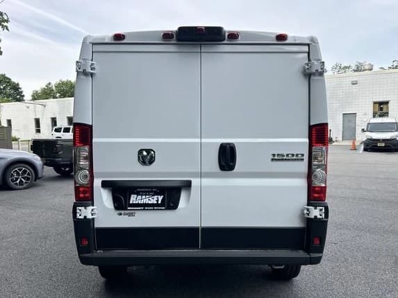 Ram ProMaster Cargo Van Tradesman 1500 Low Roof 118" WB w/Pass Seat 2026 — side view