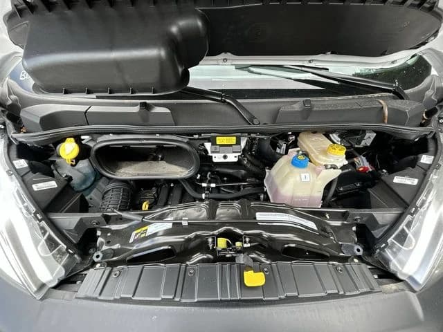 Ram ProMaster Cargo Van Tradesman 1500 Low Roof 118" WB w/Pass Seat 2026 — side view
