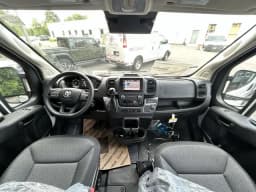 Ram ProMaster Cargo Van Tradesman 1500 Low Roof 118" WB w/Pass Seat 2026 — side view