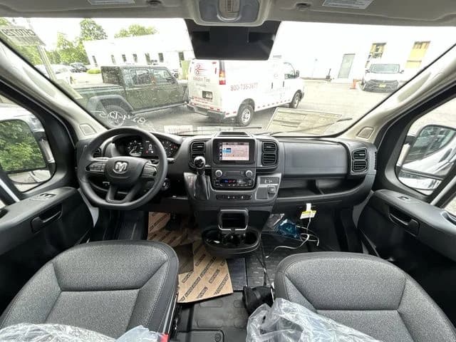 Ram ProMaster Cargo Van Tradesman 1500 Low Roof 118" WB w/Pass Seat 2026 — side view