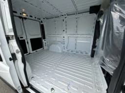 Ram ProMaster Cargo Van Tradesman 1500 Low Roof 118" WB w/Pass Seat 2026 — side view