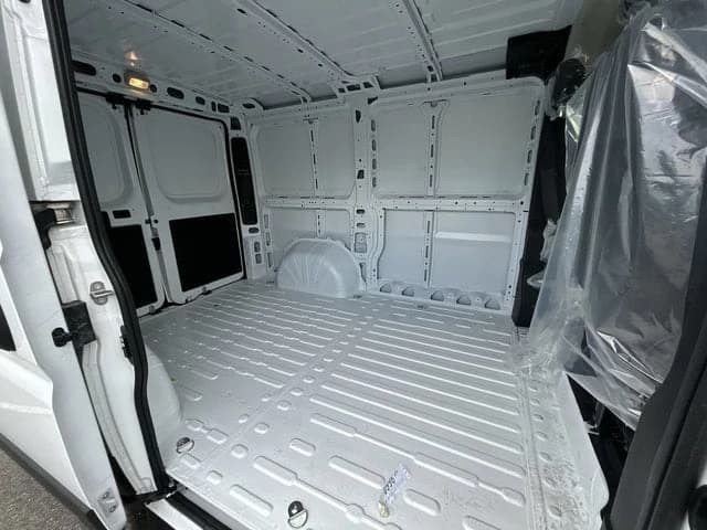 Ram ProMaster Cargo Van Tradesman 1500 Low Roof 118" WB w/Pass Seat 2026 — side view