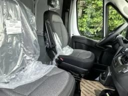 Ram ProMaster Cargo Van Tradesman 1500 Low Roof 118" WB w/Pass Seat 2026 — side view