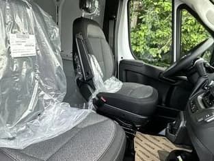 Ram ProMaster Cargo Van Tradesman 1500 Low Roof 118" WB w/Pass Seat 2026 — side view