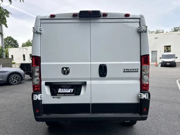 Ram ProMaster Cargo Van Tradesman 1500 Low Roof 118" WB w/Pass Seat 2026 — side view