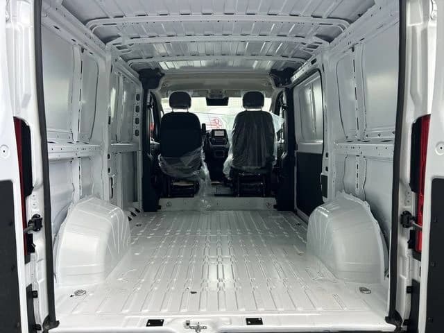 Ram ProMaster Cargo Van Tradesman 1500 Low Roof 118" WB w/Pass Seat 2026 — side view