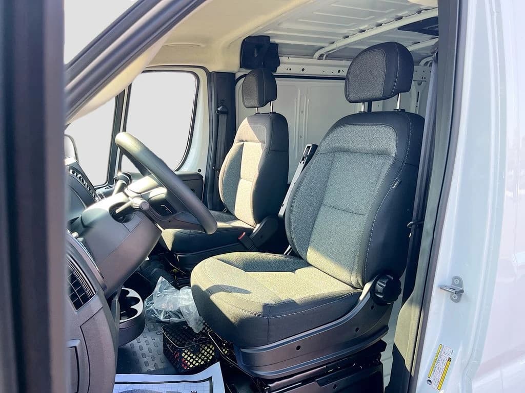 Ram ProMaster Cargo Van Tradesman 1500 Low Roof 118" WB w/Pass Seat 2026 — side view