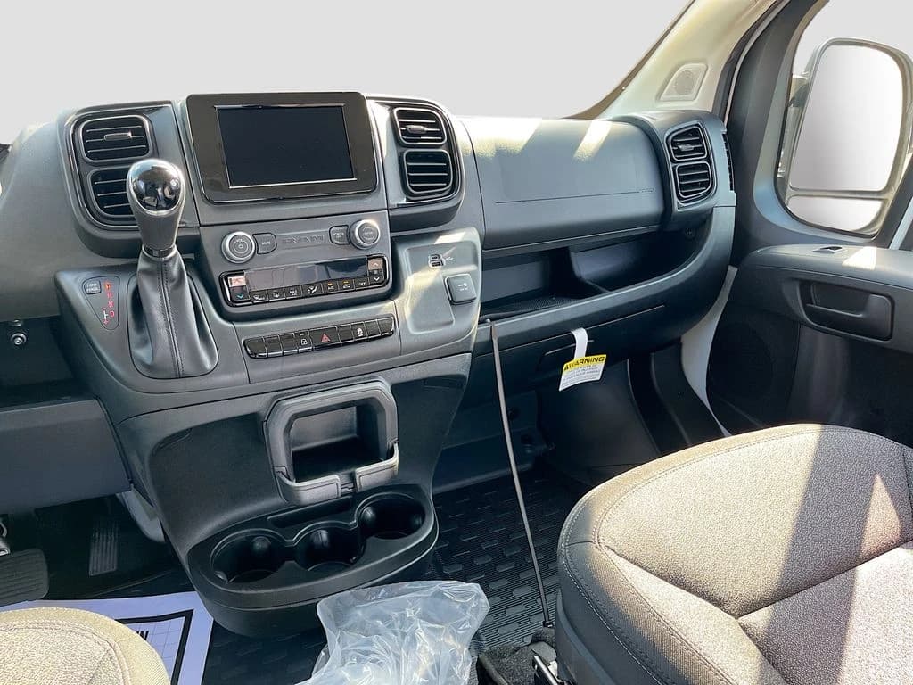 Ram ProMaster Cargo Van Tradesman 1500 Low Roof 118" WB w/Pass Seat 2026 — side view