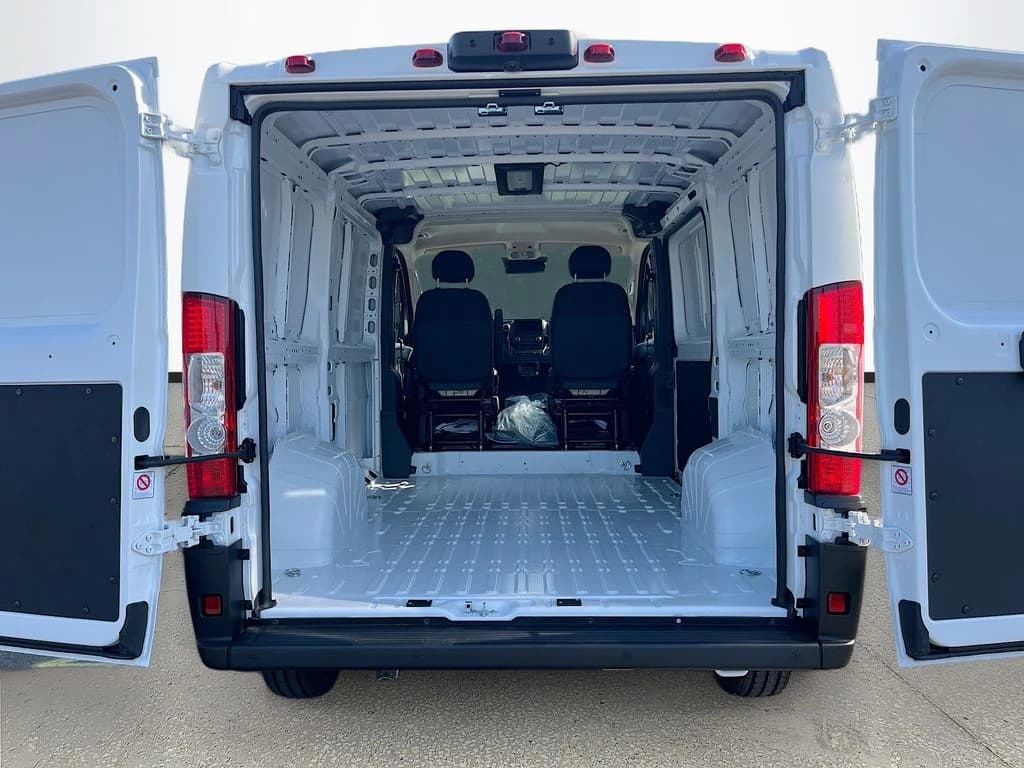 Ram ProMaster Cargo Van Tradesman 1500 Low Roof 118" WB w/Pass Seat 2026 — side view