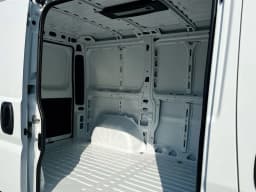 Ram ProMaster Cargo Van Tradesman 1500 Low Roof 118" WB w/Pass Seat 2026 — side view