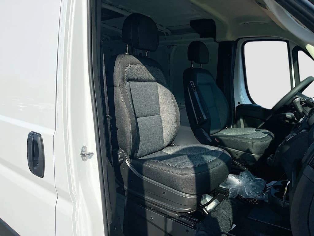 Ram ProMaster Cargo Van Tradesman 1500 Low Roof 118" WB w/Pass Seat 2026 — side view