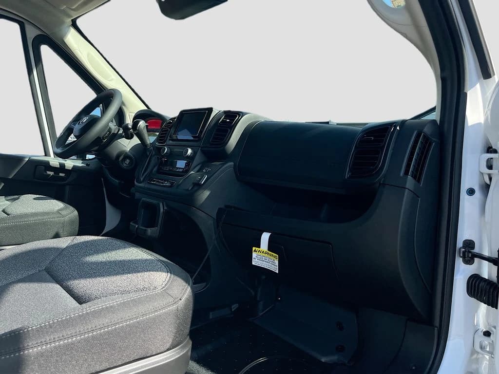 Ram ProMaster Cargo Van Tradesman 1500 Low Roof 118" WB w/Pass Seat 2026 — side view