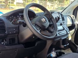 Ram ProMaster Cargo Van Tradesman 1500 Low Roof 118" WB w/Pass Seat 2026 — side view