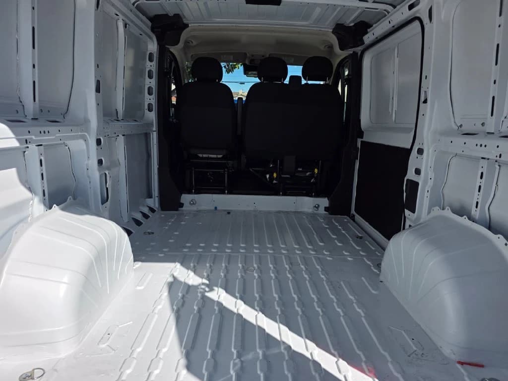 Ram ProMaster Cargo Van Tradesman 1500 Low Roof 118" WB w/Pass Seat 2026 — side view
