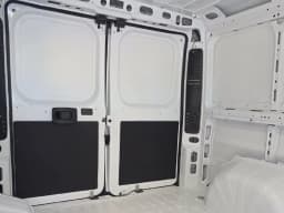 Ram ProMaster Cargo Van Tradesman 1500 Low Roof 118" WB w/Pass Seat 2026 — side view