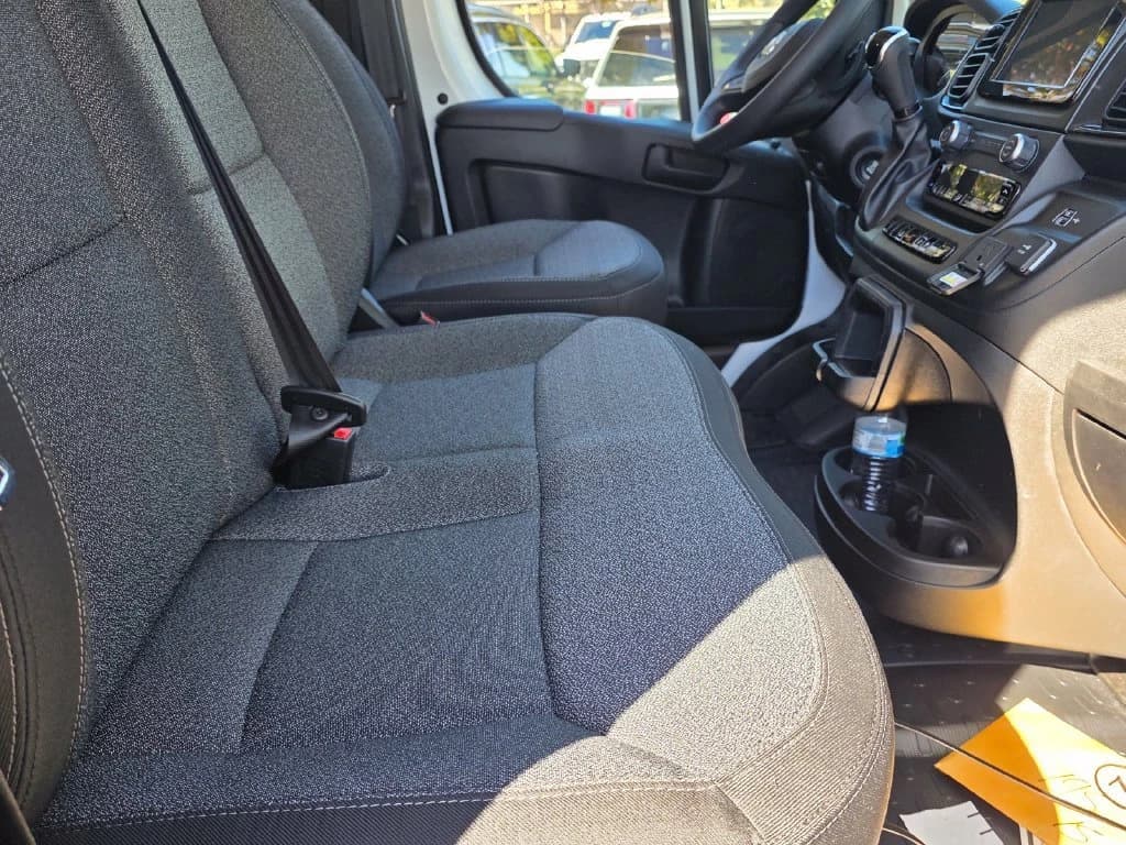 Ram ProMaster Cargo Van Tradesman 1500 Low Roof 118" WB w/Pass Seat 2026 — side view