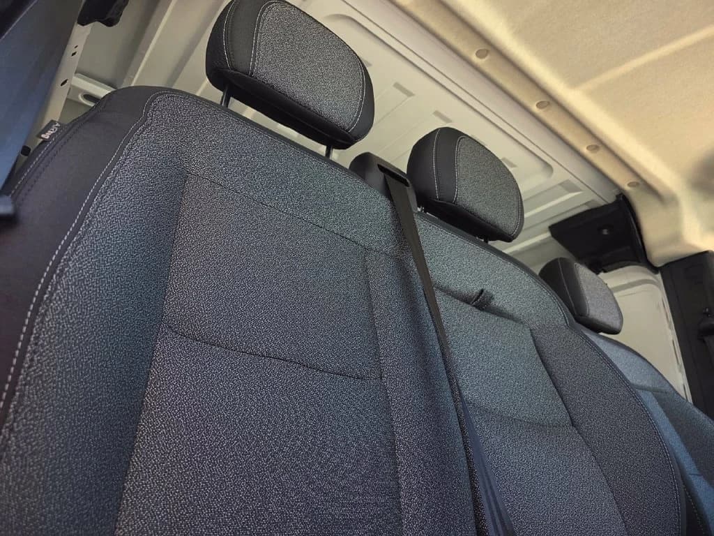 Ram ProMaster Cargo Van Tradesman 1500 Low Roof 118" WB w/Pass Seat 2026 — side view