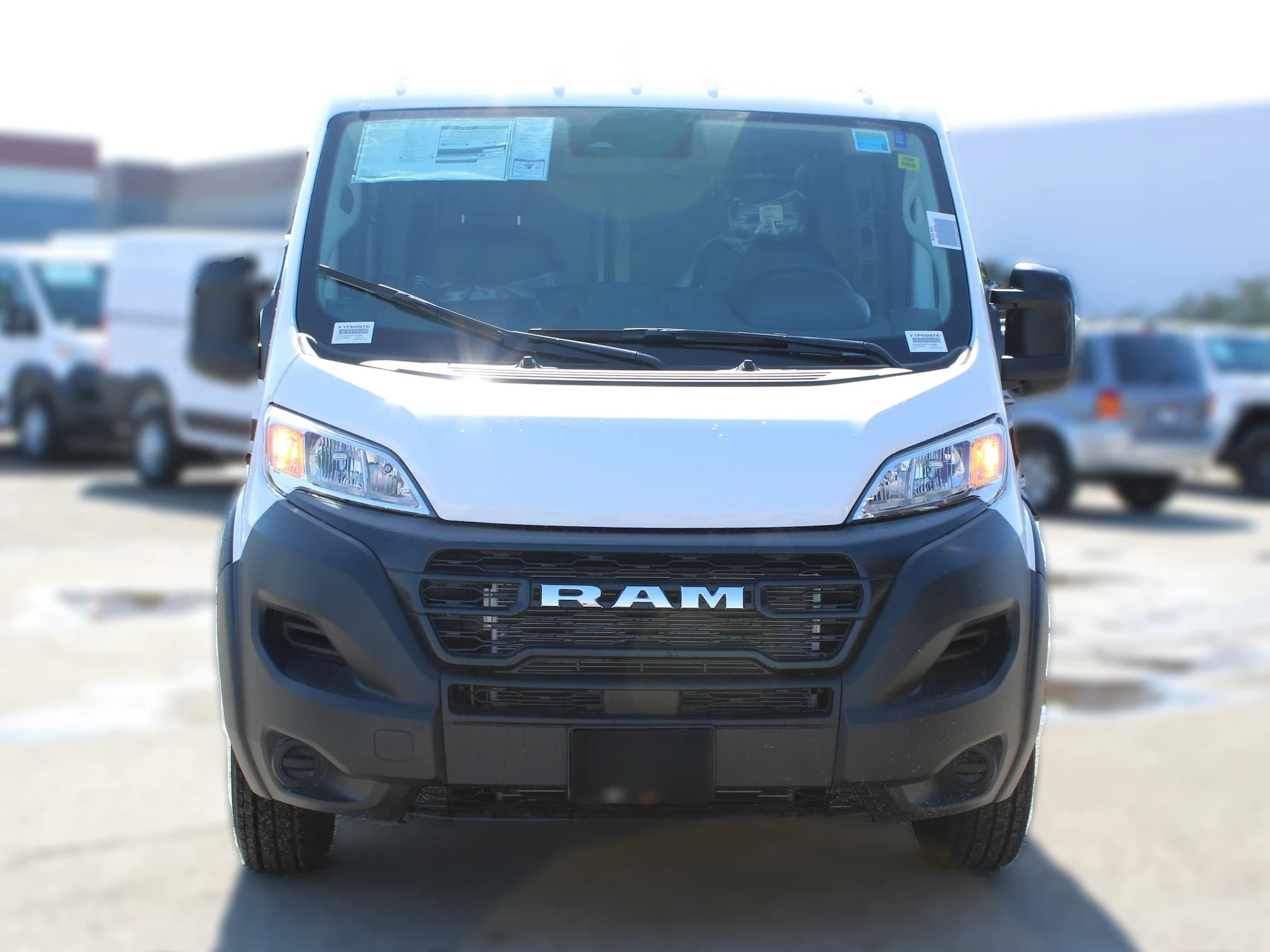 Ram ProMaster Cargo Van Tradesman 1500 Low Roof 118" WB w/Pass Seat 2026 — side view
