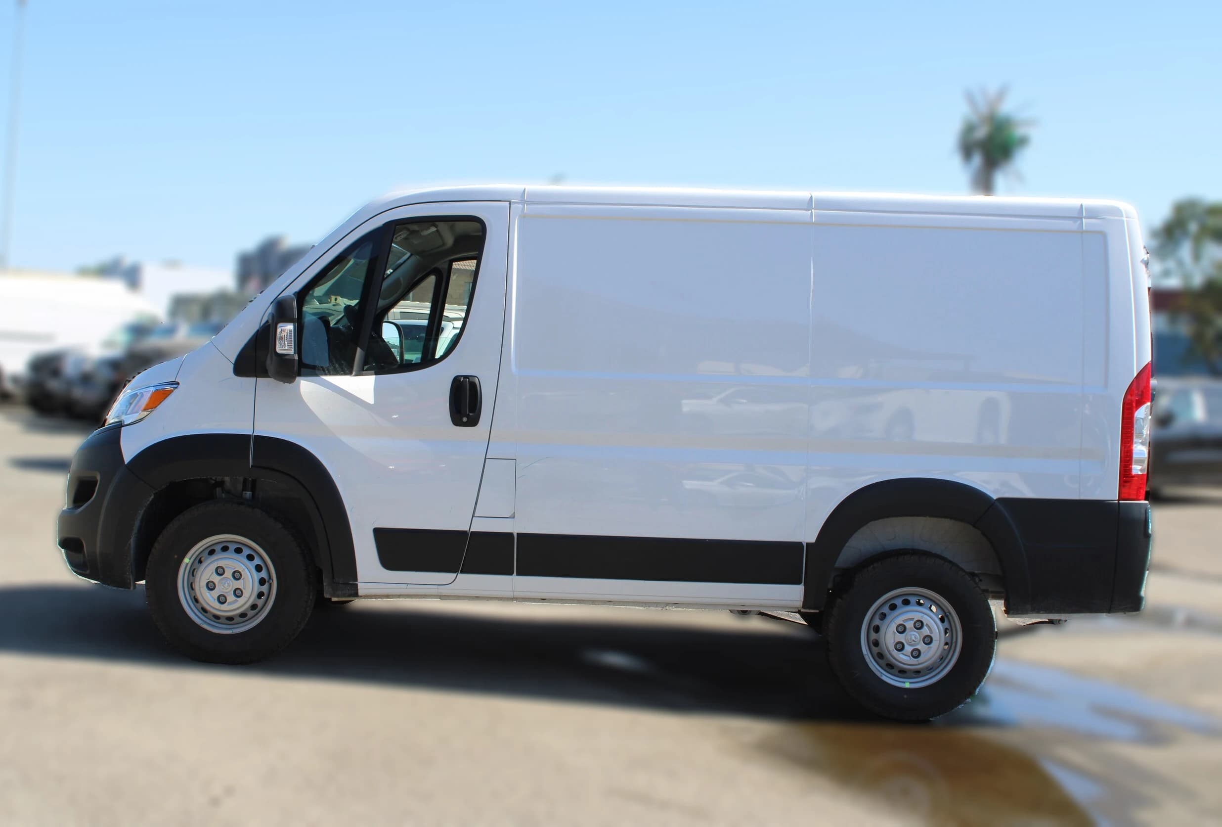 Ram ProMaster Cargo Van Tradesman 1500 Low Roof 118" WB w/Pass Seat 2026 — side view