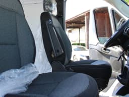 Ram ProMaster Cargo Van Tradesman 1500 Low Roof 118" WB w/Pass Seat 2026 — side view