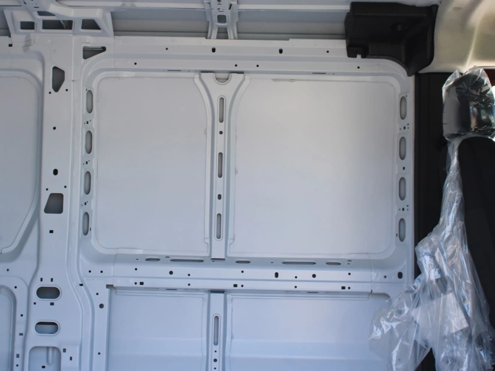 Ram ProMaster Cargo Van Tradesman 1500 Low Roof 118" WB w/Pass Seat 2026 — side view