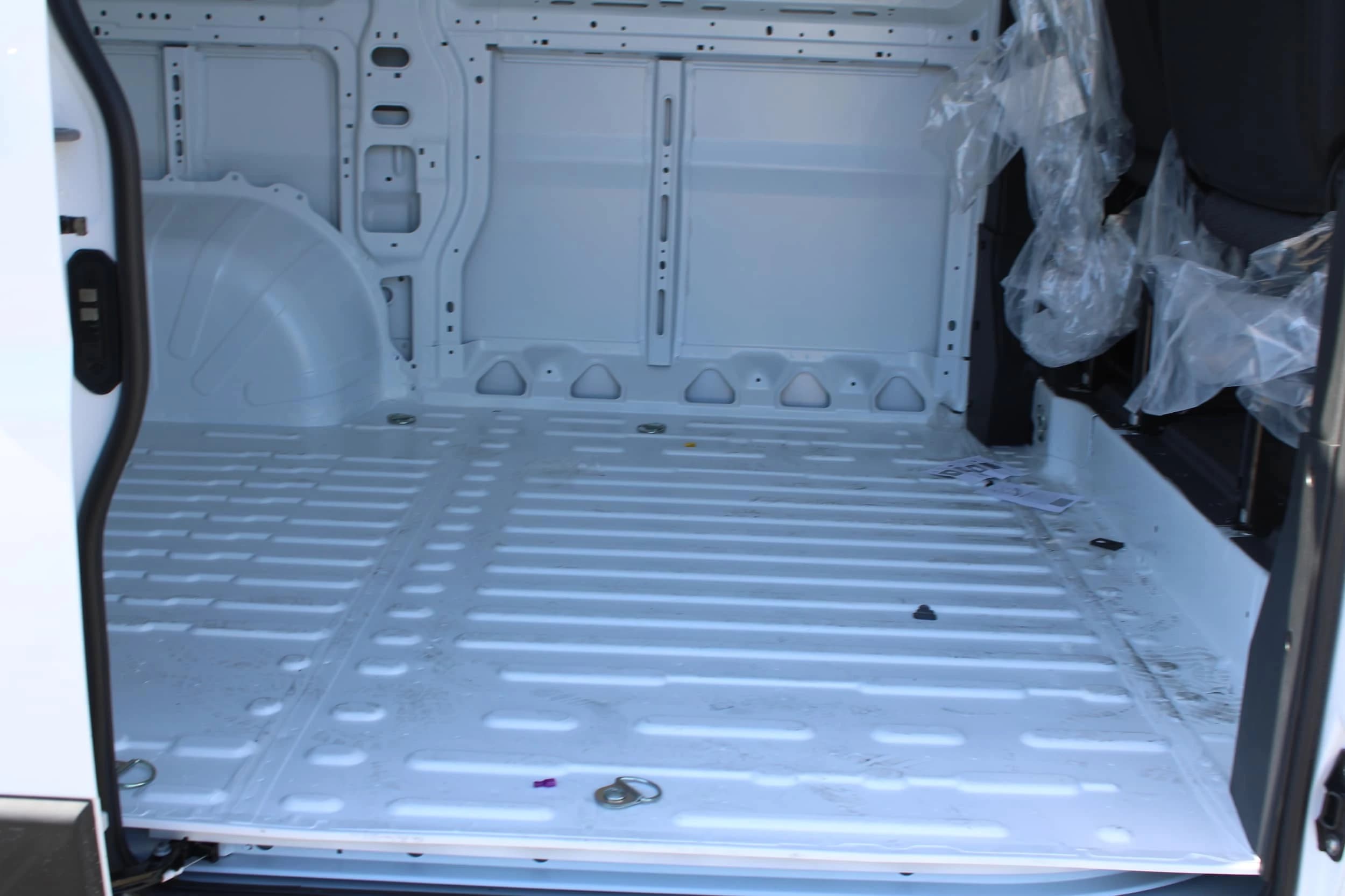 Ram ProMaster Cargo Van Tradesman 1500 Low Roof 118" WB w/Pass Seat 2026 — side view